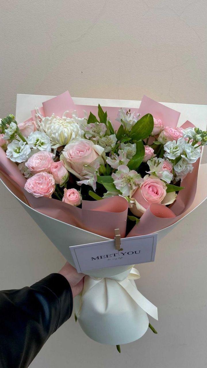 Corporate meeting room with carefully timed floral arrangements that maintain elegance throughout business hours